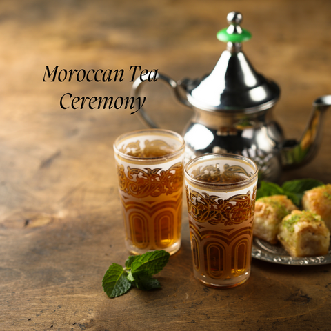 Moroccan Tea Ceremony, 2 cups of Mint tea and silver pot in background