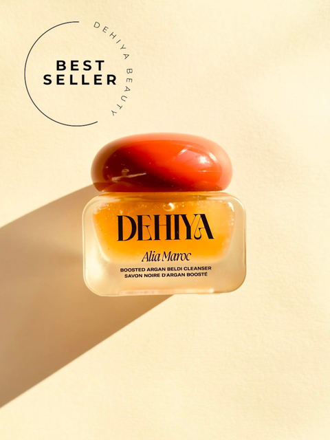 BEST SELLER Jar of Dehiya Alia Maroc cleanser with red mushroom cap on beige background