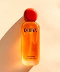 DEHIYA Queen Amina, orange colored oil, red cap flat lay